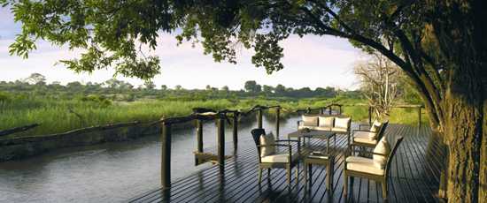 Lounge beside the Sabie River on the deck at Lion Sands