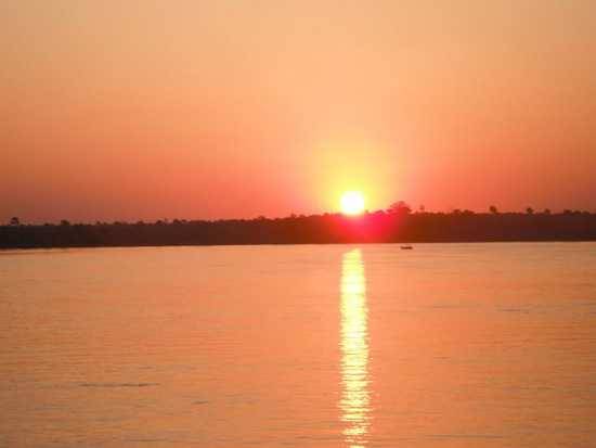 Enjoy incredible African sunsets over the Zambezi River