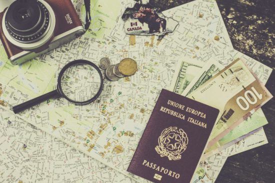 A passport, map, money and camera