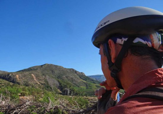 A fellow mountain biker plots his path...