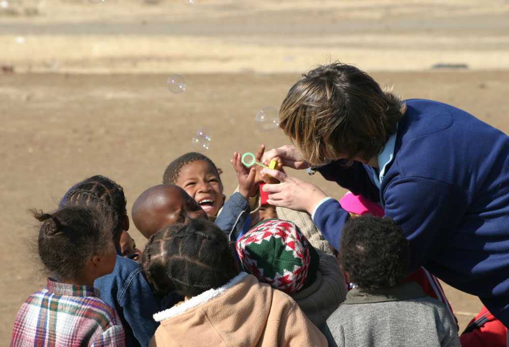 Kate playing with kids in Philippolis