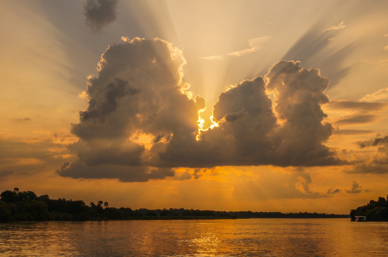 The magical moment as the sun glows behind clouds