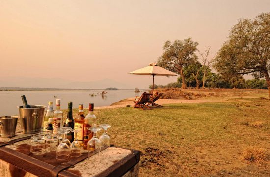 Zambezi Life Styles - drinks by the river bank