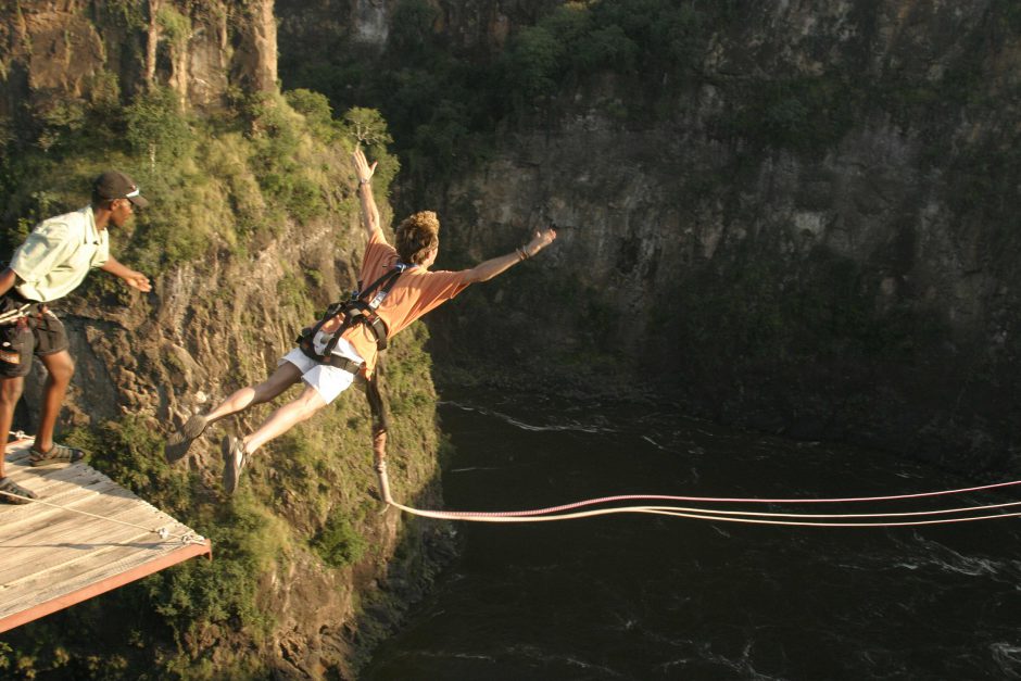 A man bungee jumps at Victoria Falls