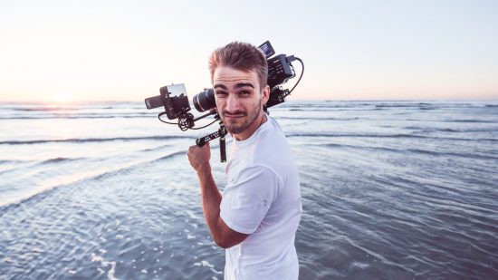 Cameraman hard at work on the beach