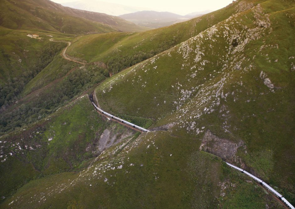 Train going over mountain pass