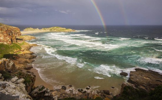 Seascape with rainbow at Robberg, Plettenberg Bay, Garden Route, South Africa