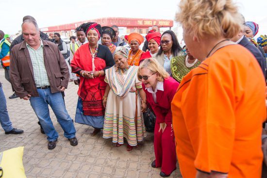 Helen Zille and Mama Gloria cut the ribbon at Khumbulani Centre's official opening ceremony