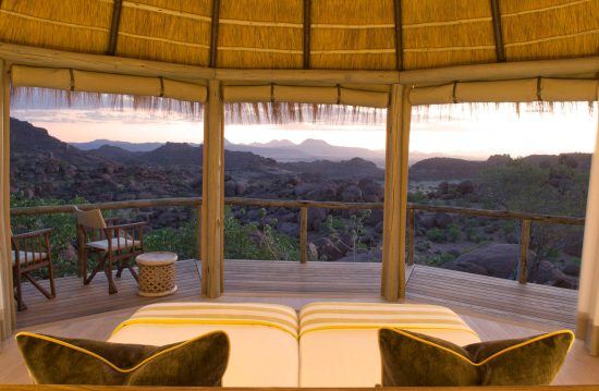 A mountainous view from bed