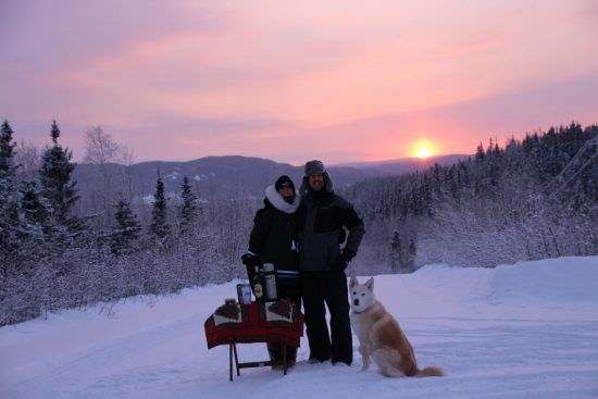 Two biologists enjoy sundowners in Labrador, Canada