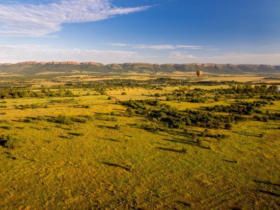 Hot air balloon ride over the African savannah