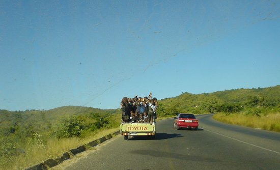 Kids on the back of a truck bakkie