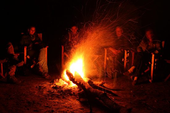 Dinner by camp fire