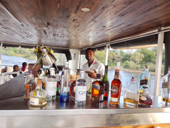 Enjoying a river cruise (with drinks)