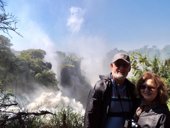 The couple standing near the Victoria Falls