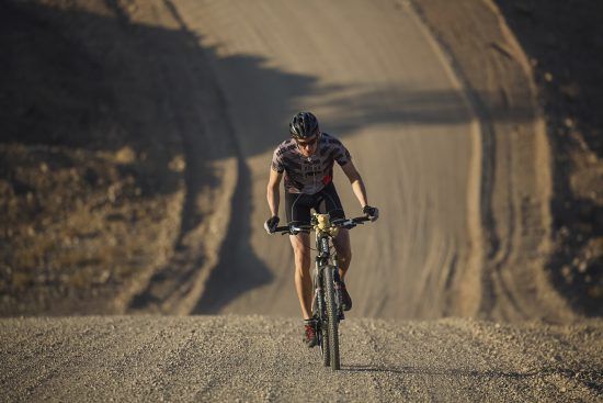 A Challenge4ACause cyclist riding uphill