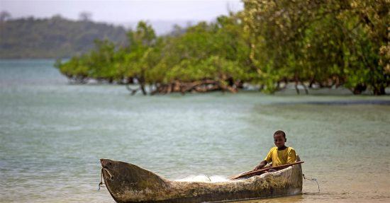 Boy in a dhow boat in Mozambique