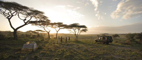 sundowners on safari with serengeti under canvas in tanzania's serengeti