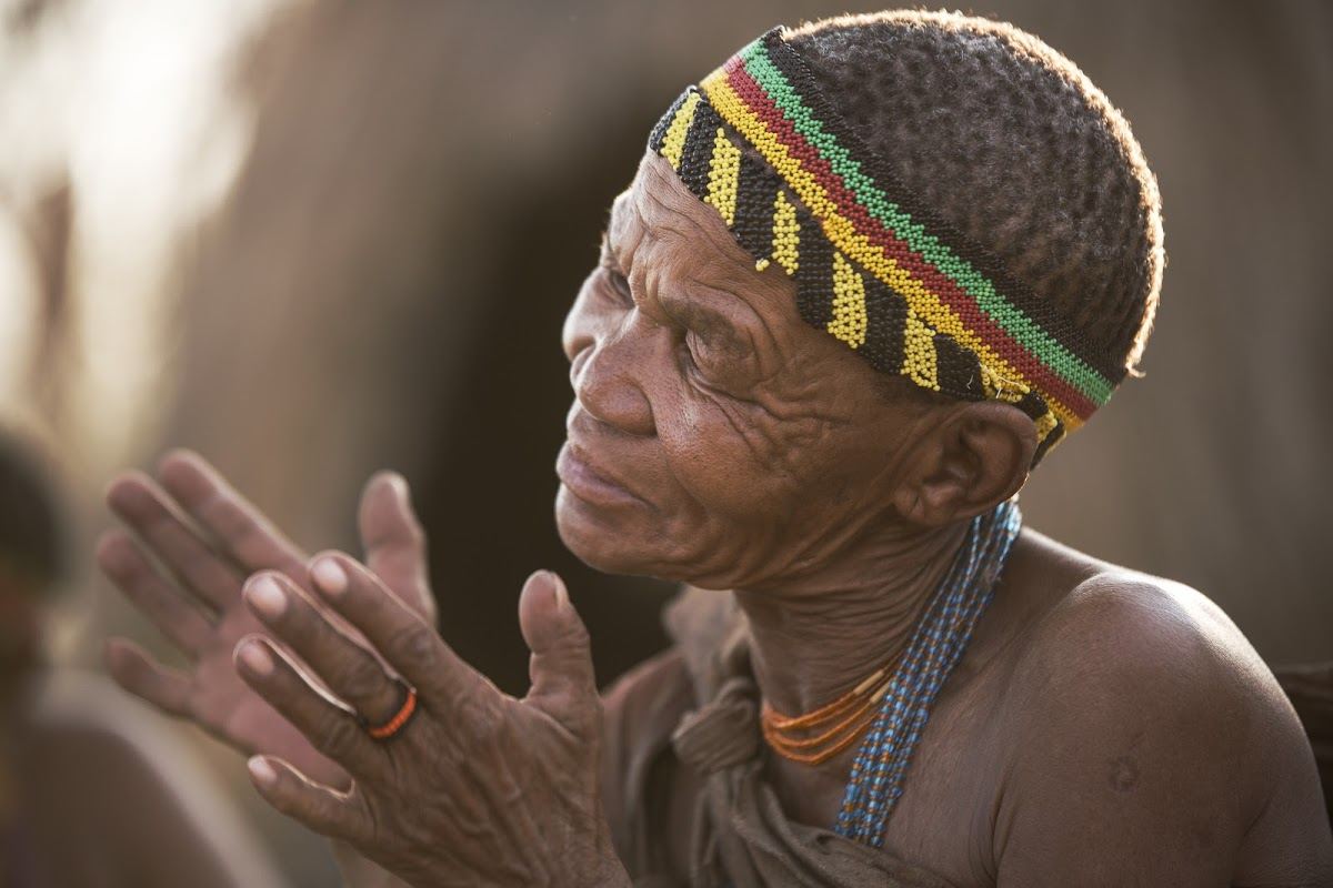 San man in traditional dress in Rhino Africa's Complete Guide