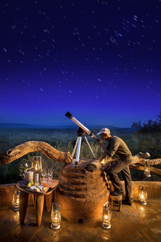 A candle-lit telescope setup at Madikwe Safari Lodge 