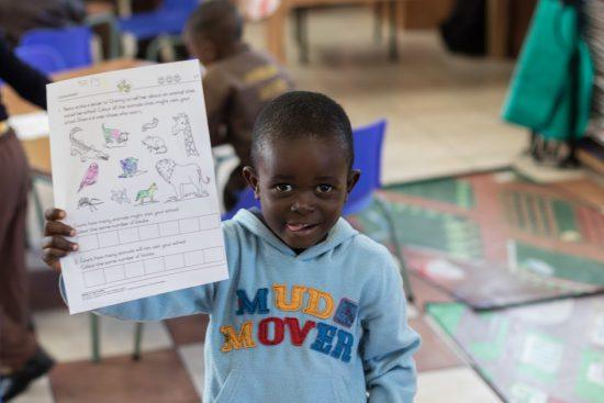 A child at Khumbulani showing his colouring