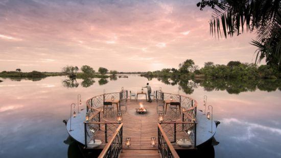 The deck set on the waters surrounding Thorntree River Lodge