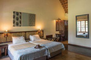 The bedrooms are warm and comfortable at Hippo Hollow Country Estate luxury African safari