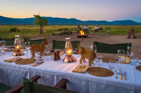 Eating in the open veld is a highlight of a John's Camp stay