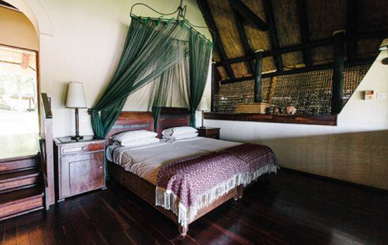 Woods and soft hues dominate inside the interiors at Chilo Gorge Safari Lodge