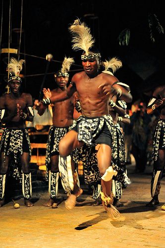 A Shona traditional dancer mid-leap