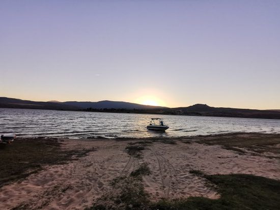 Sunset cruise activity over the Clanwilliam Dam with Cederberg Ridge Wilderness Lodge