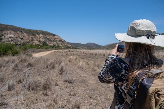 Kadda taking a photo on the Pioneer Trail