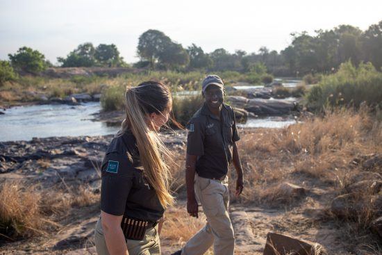 Lee and her tracker on a bush walk near Lion Sands Ivory Lodge