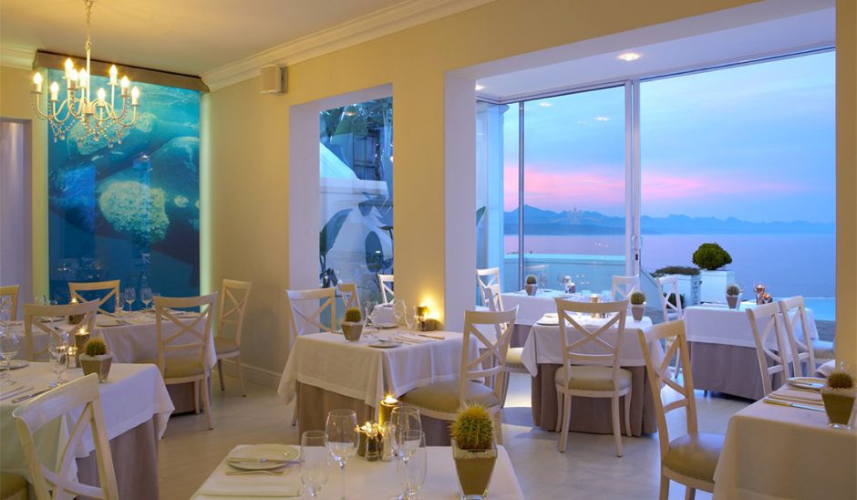 The restaurant’s indoor dining section offers beautiful views of the pool and ocean