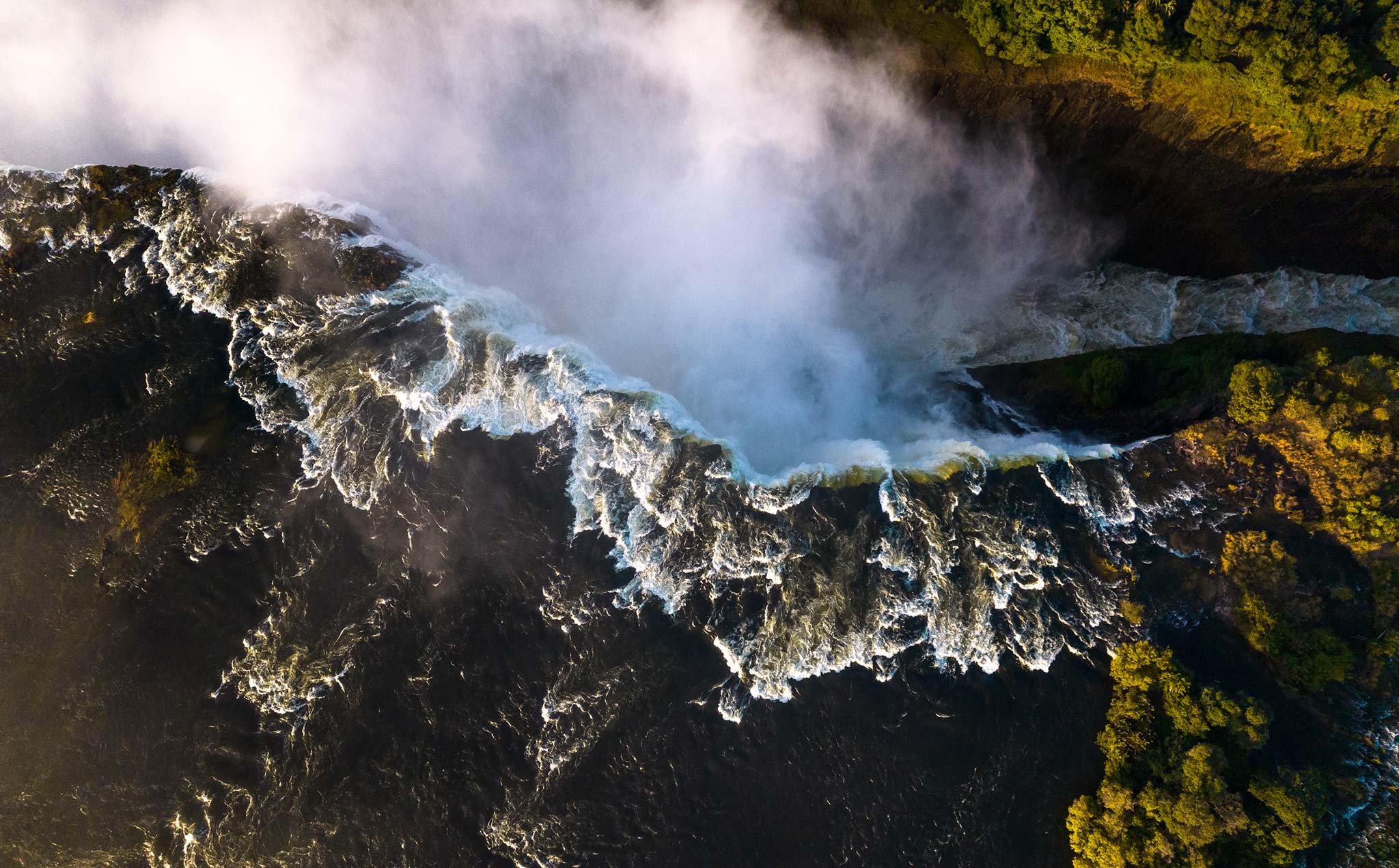 Aerial photo of Victoria Falls gushing down