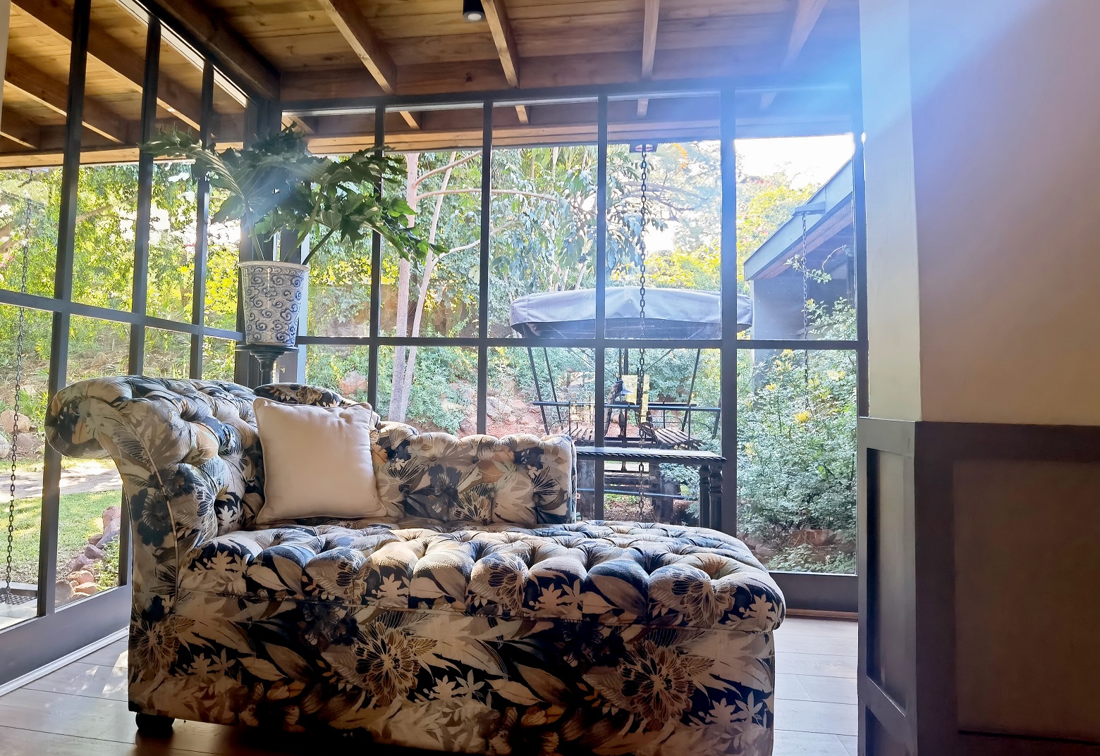 Reading nook in front of fireplace at Stanlet & Livingstone Boutique Hotel