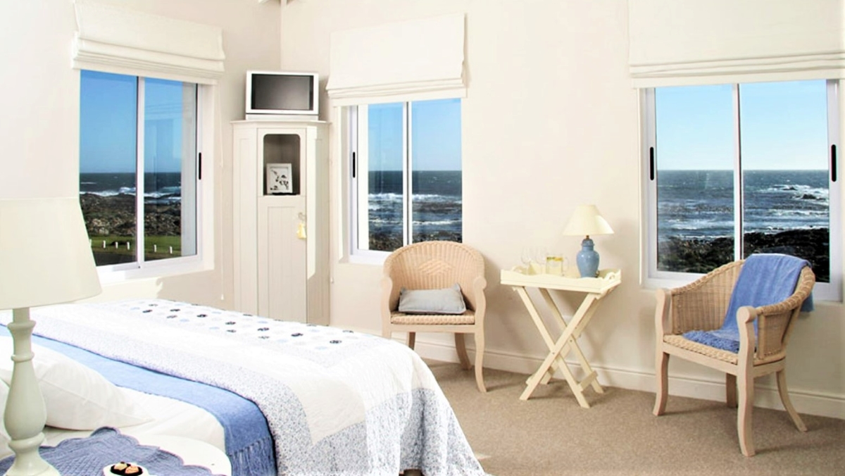 Oyster Room with sea views at the 138 Marine Beachfront, one of the top hotels for whale watching in South Africa