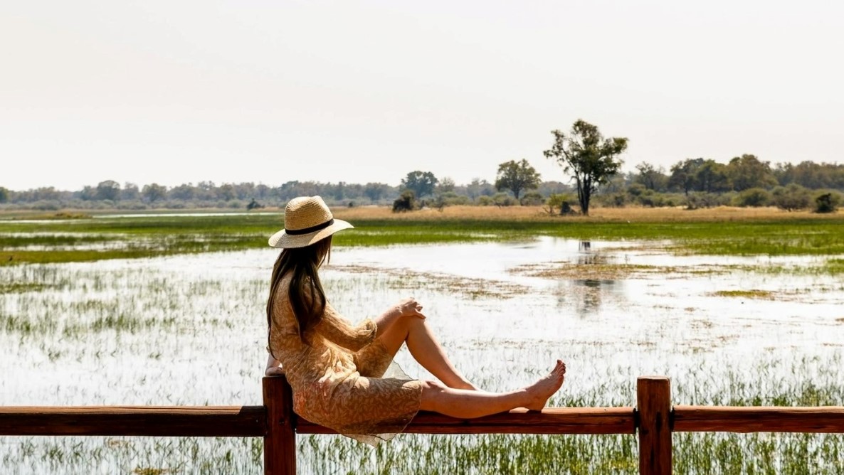 Woman content in solitude observing the beauty of the Delta