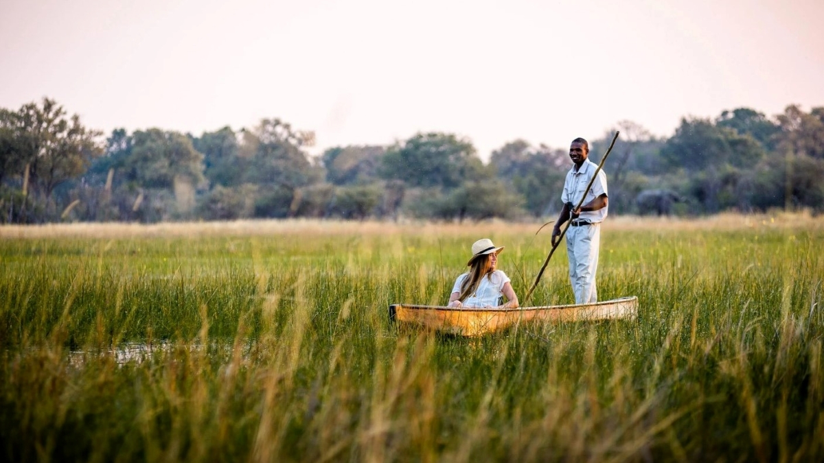 Gliding on the quiet Delta waters via mokoro