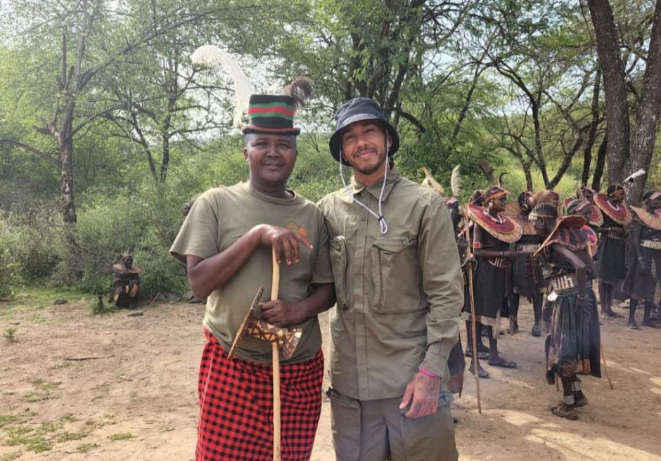 Lewis Hamilton visiting a local Maasai tribe in Kenya