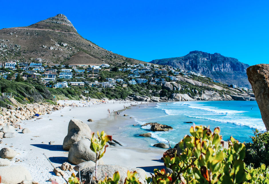 Scenic landscape of Llandudno Beach with white sand and turquoise water in Cape Town