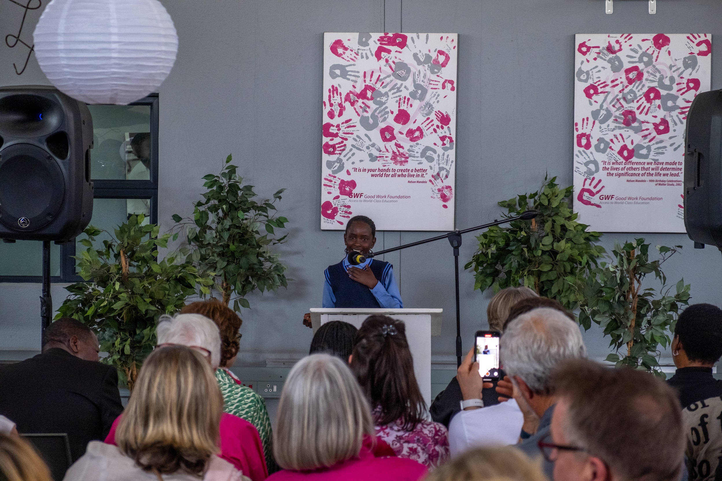 Young girl learner gives speech at The Good Work Foundation 10th anniversary