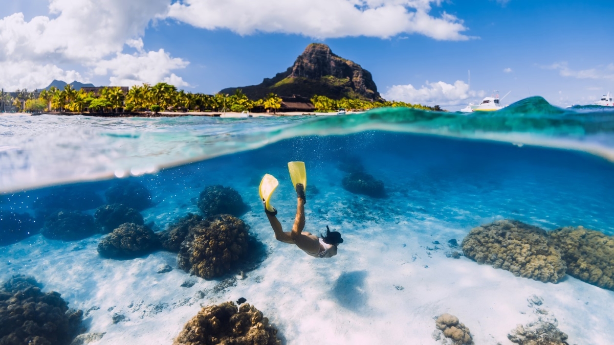 Crystal clear waters surround coral-filled shores