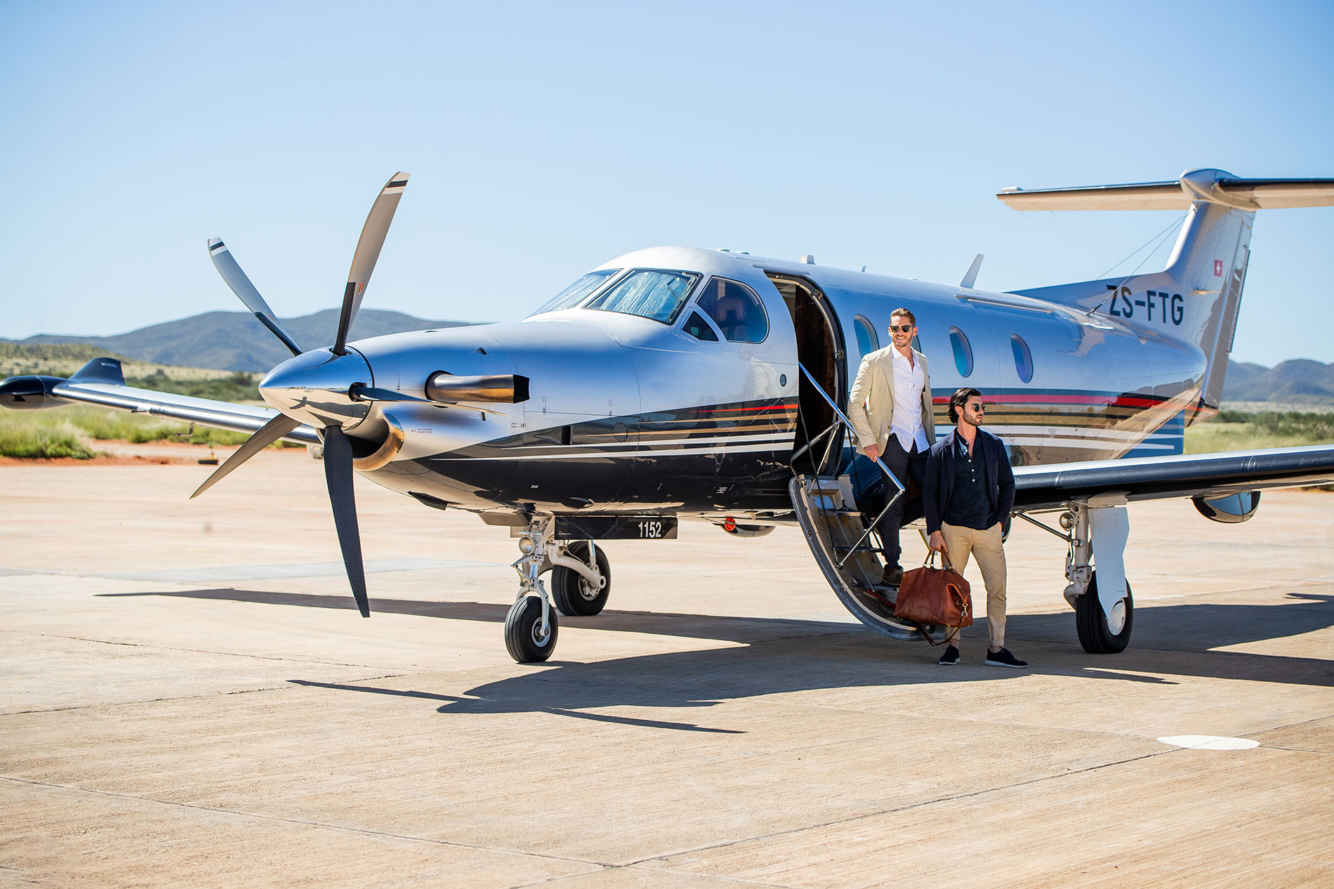 disembark a jet plane on safari