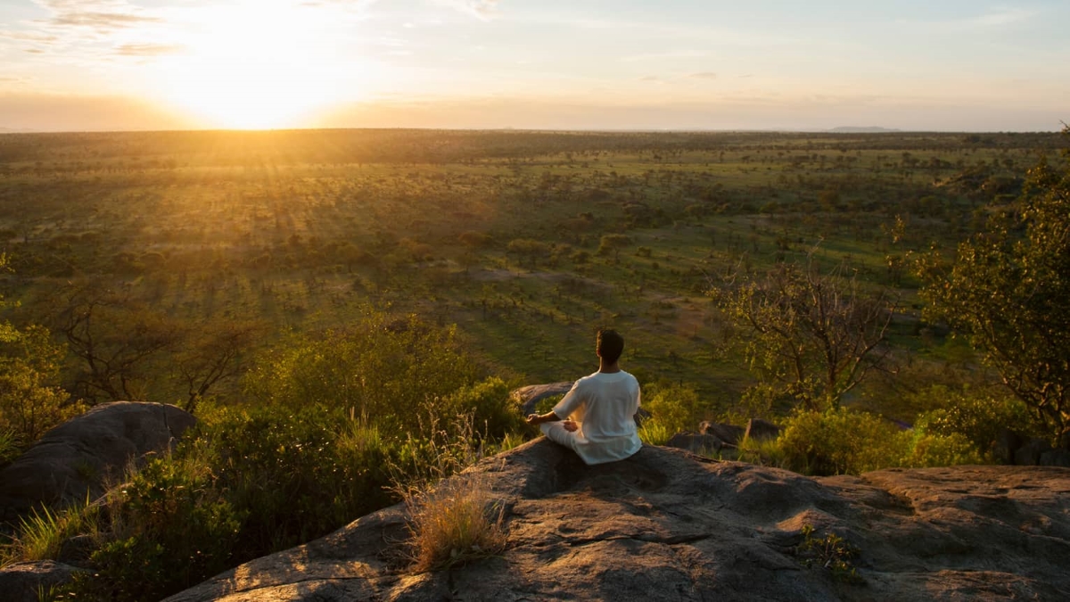 Meditating at sunset