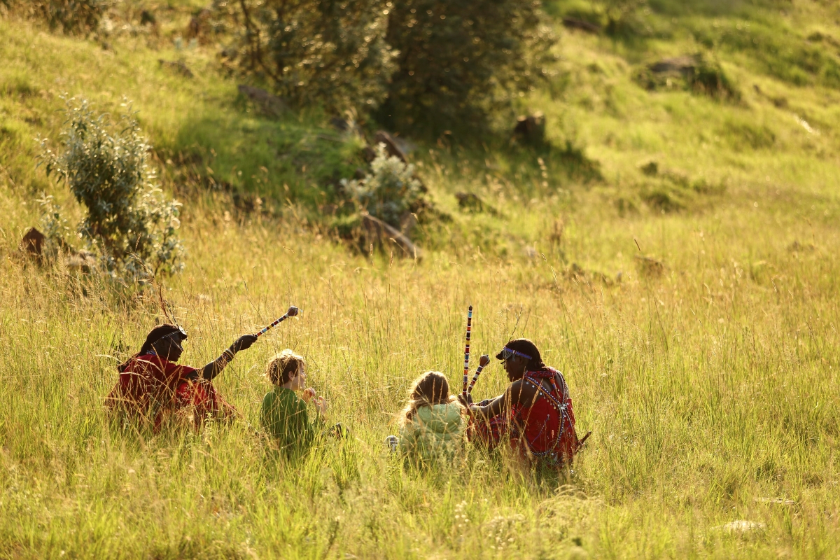 Children on safari with Maasai Guides in the Maasai Mara Game Reserve