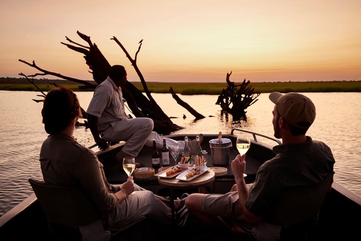 Couple on a private sundowner boat trip with snacks