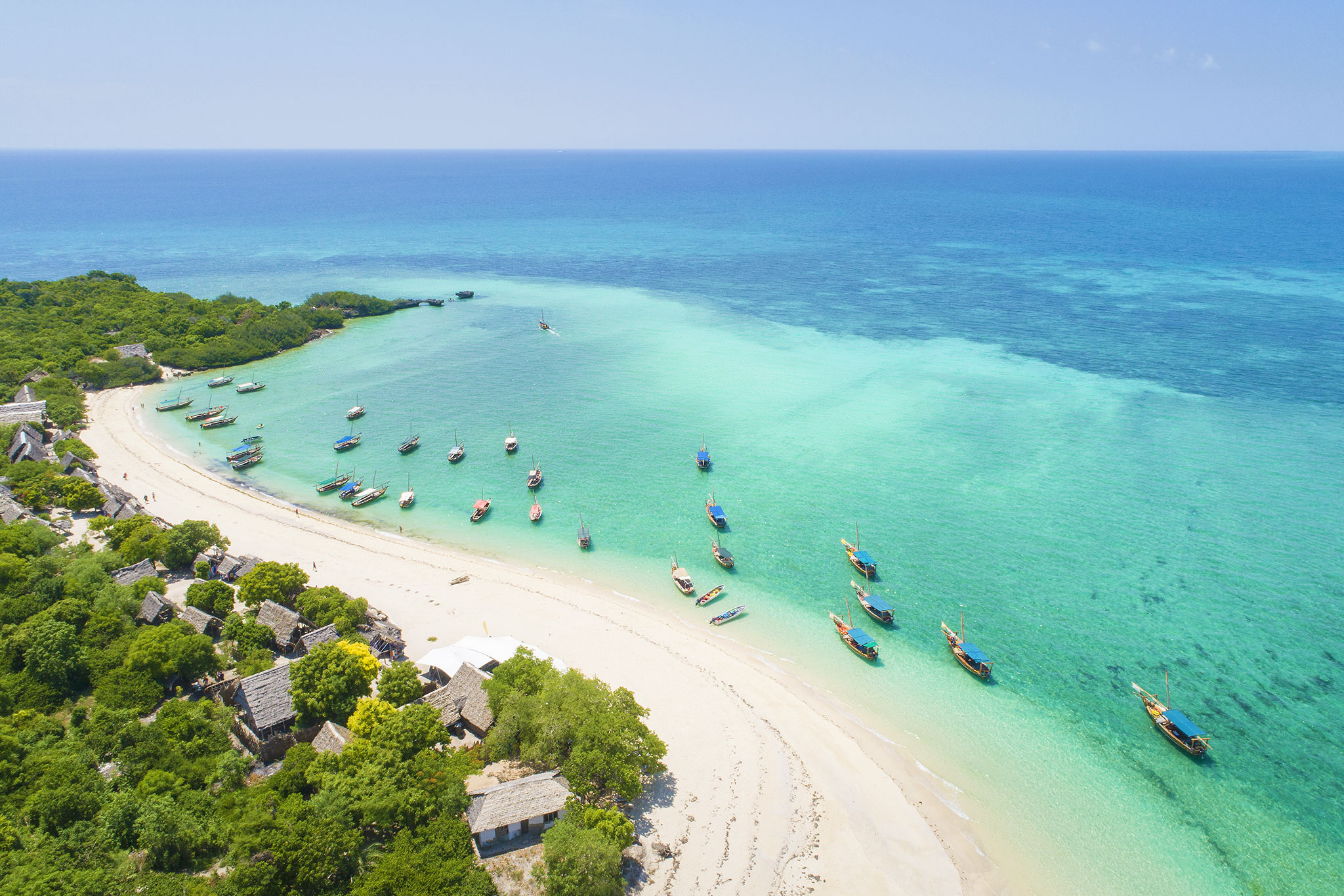 Beautiful beach with boats on Zanzibar Island