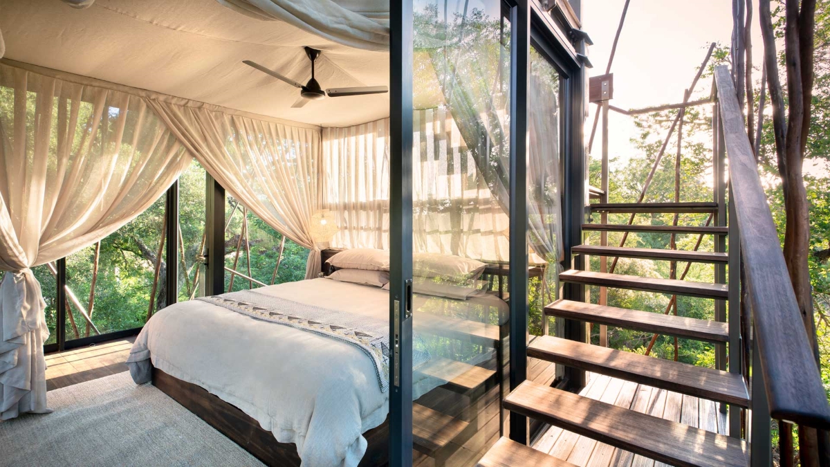 Bedroom on one level of the enchanting Ngala Treehouse