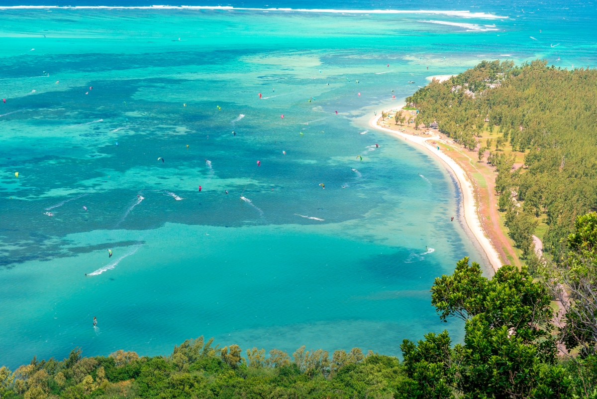 When to Visit Mauritius; aerial view of many people windsurfing in Mauritius